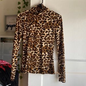 Cheetah print turtle neck